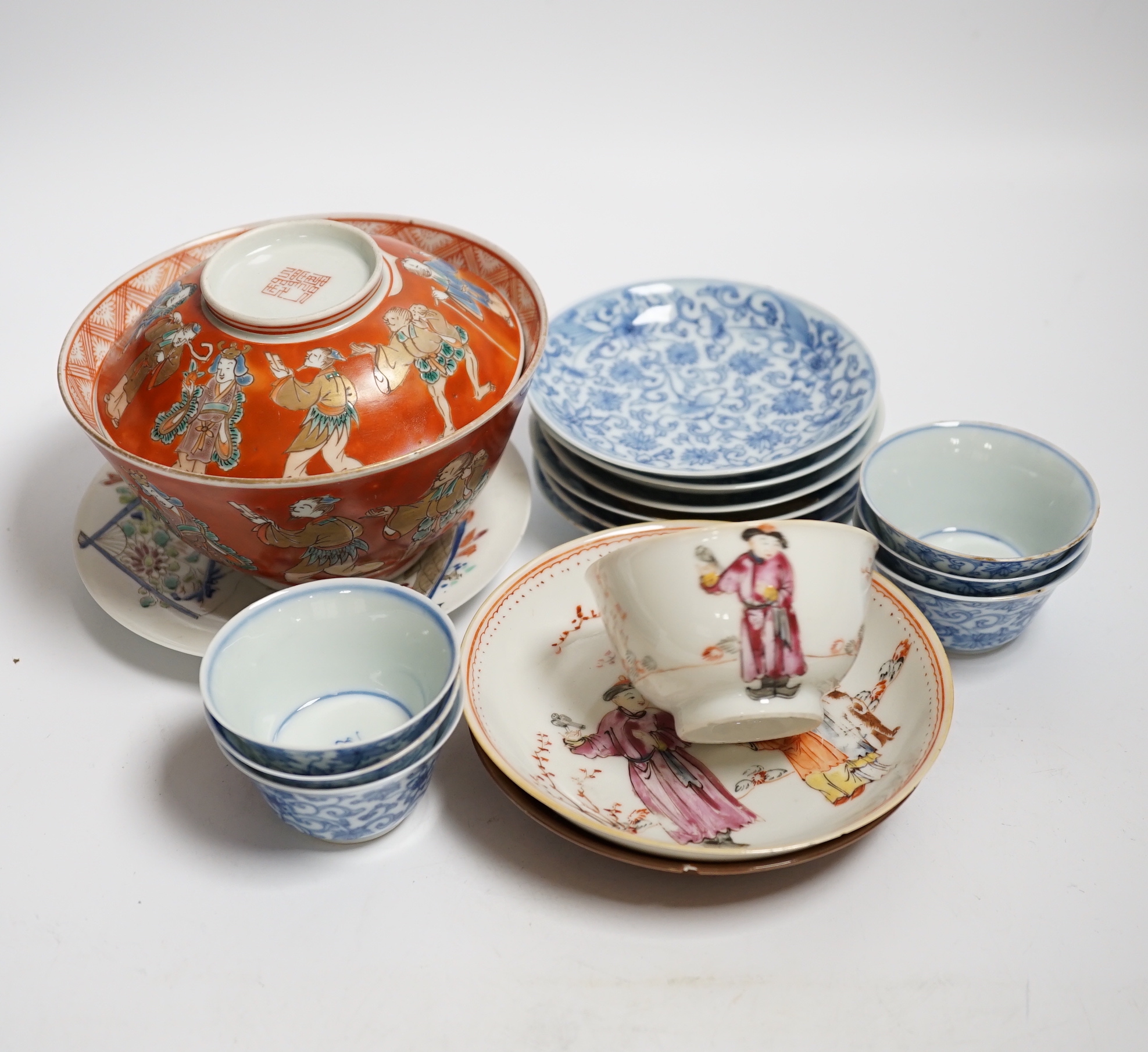 A set of six Chinese blue and white tea bowls and saucers, Kangxi period, a Chinese famille rose tea bowl and saucer, a Batavia ware saucer, both 18th century and Japanese ceramics